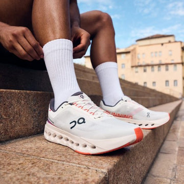 On Cloudsurfer Next white orange