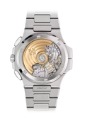 a Patek Philippe Nautilus Travel Time Chronograph reference 5990/1A