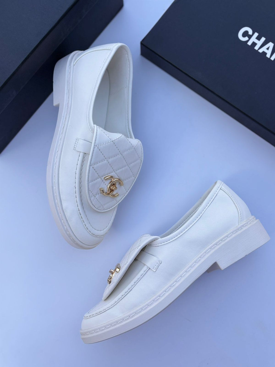 CHANEL White Lambskin Quilted CC Turnlock Loafers